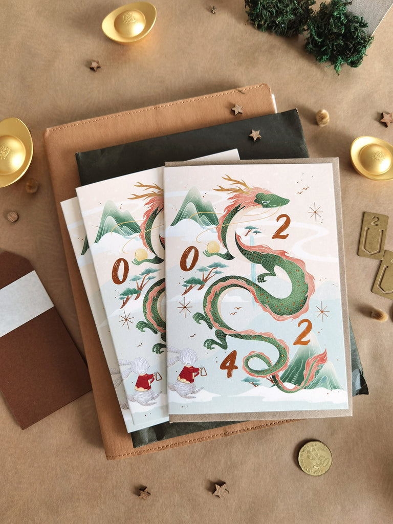 Dragon Year 2024 CNY Card with illustrated wood dragon soars into the sky, printed with copper foil stamping. Perfect for festive greetings.