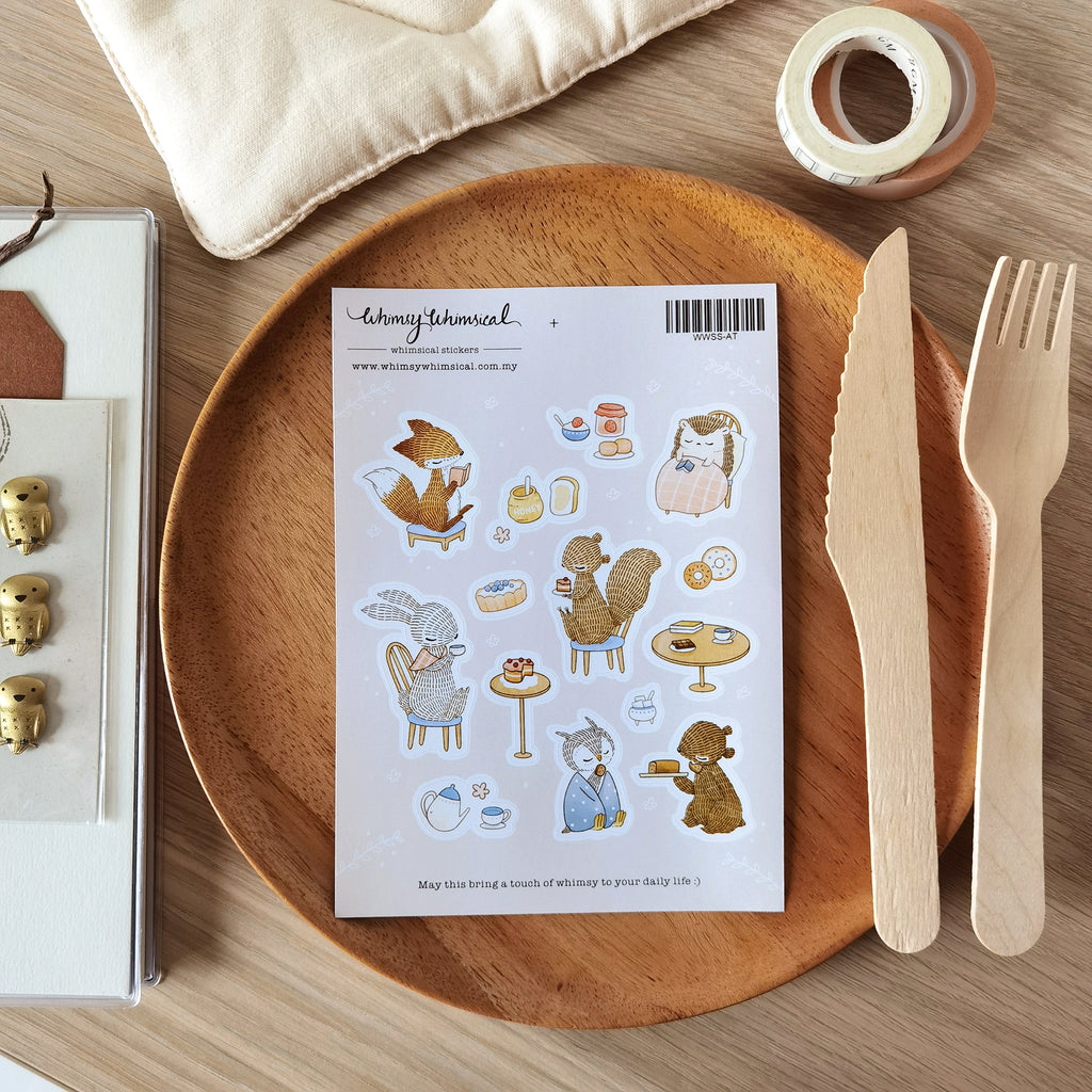 Afternoon Tea Sticker Sheet with forest animals enjoy tea, cakes, and books. Ideal for creative journaling and gift decoration.