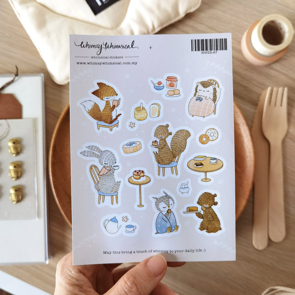 Afternoon Tea Sticker Sheet with forest animals enjoy tea, cakes, and books. Ideal for creative journaling and gift decoration.