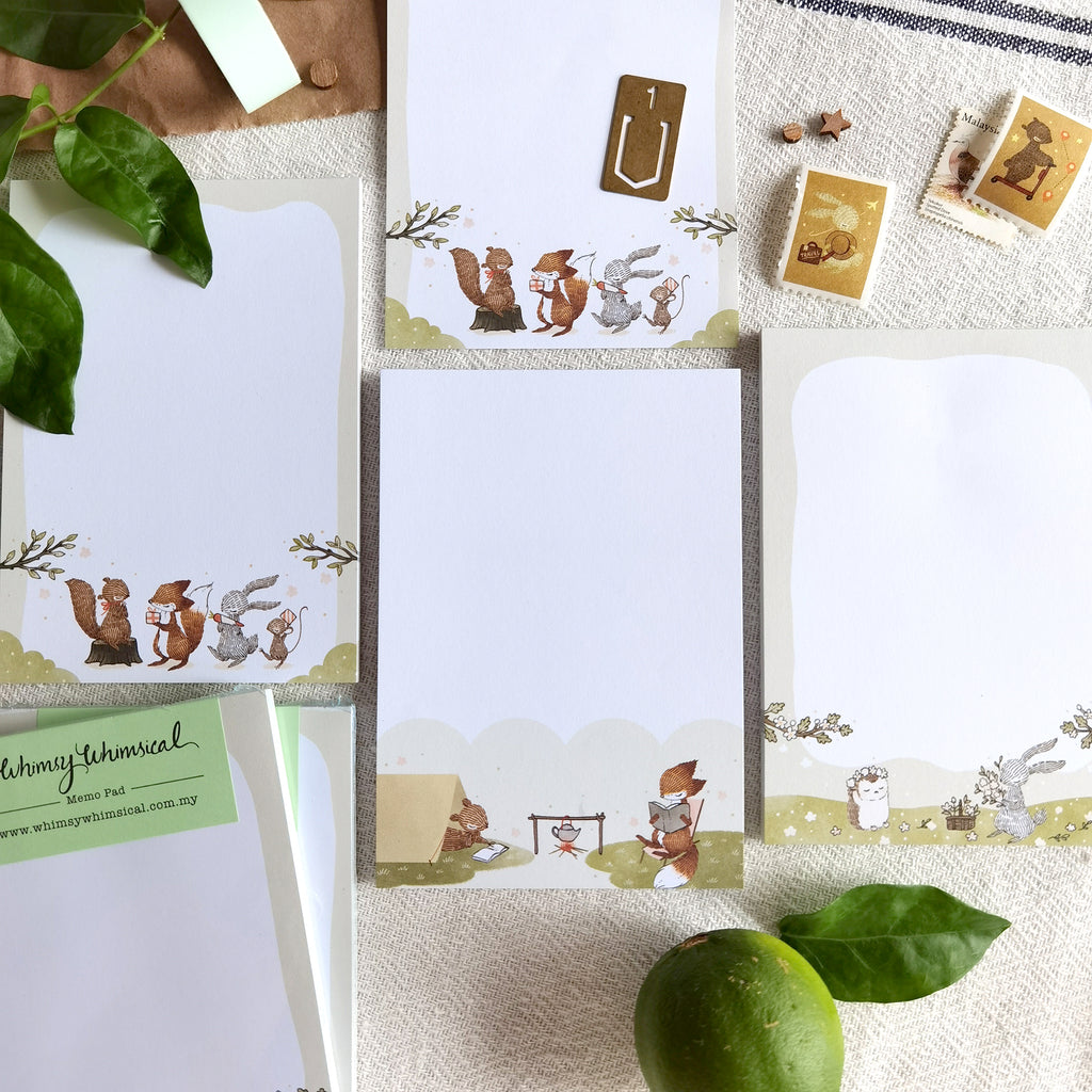 Summer themed memo pads feature forest animals with outdoor activities, ideal for jotting notes and creative ideas.