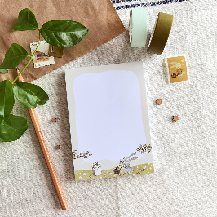 Summer Meadow Blooms Memo Pad - Whimsical rabbit and hedgehog crafting flower crowns under the summer sun, capturing the essence of the outdoor season.